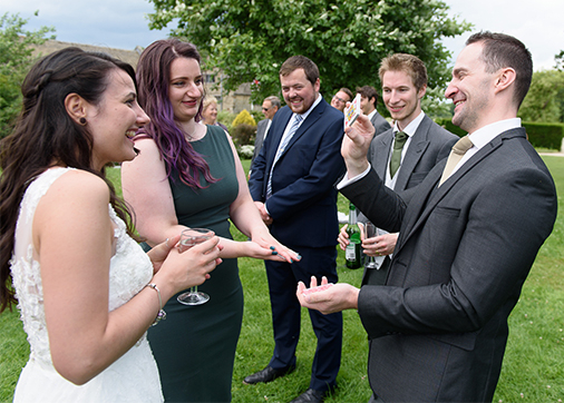 wedding magician Matthew performing for guests